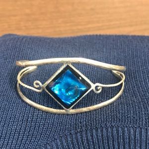 Cute Gold Tone Bracelet with Blue Stone